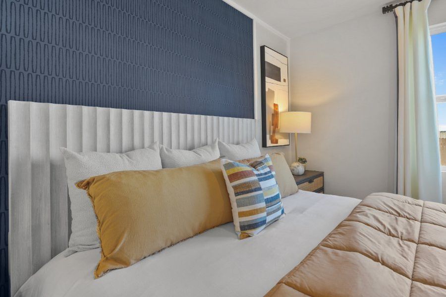 A bed with pillows.
