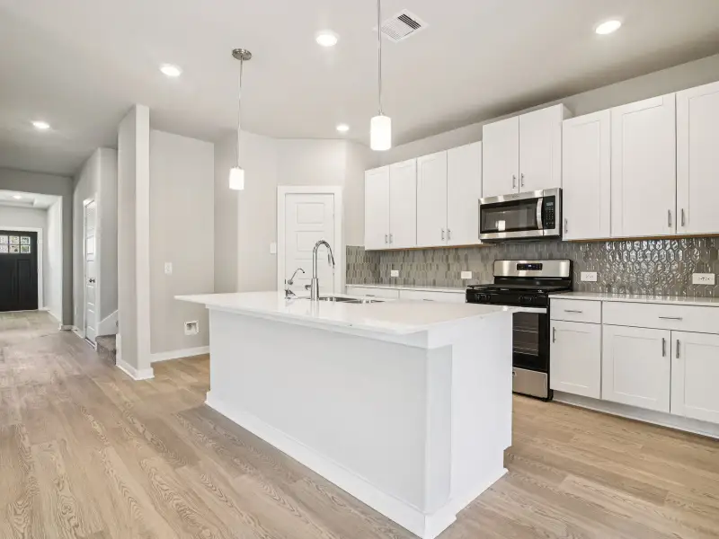 Furnished interior in a model home at Massey Oaks - Estate Series in Pearland (Image 8).