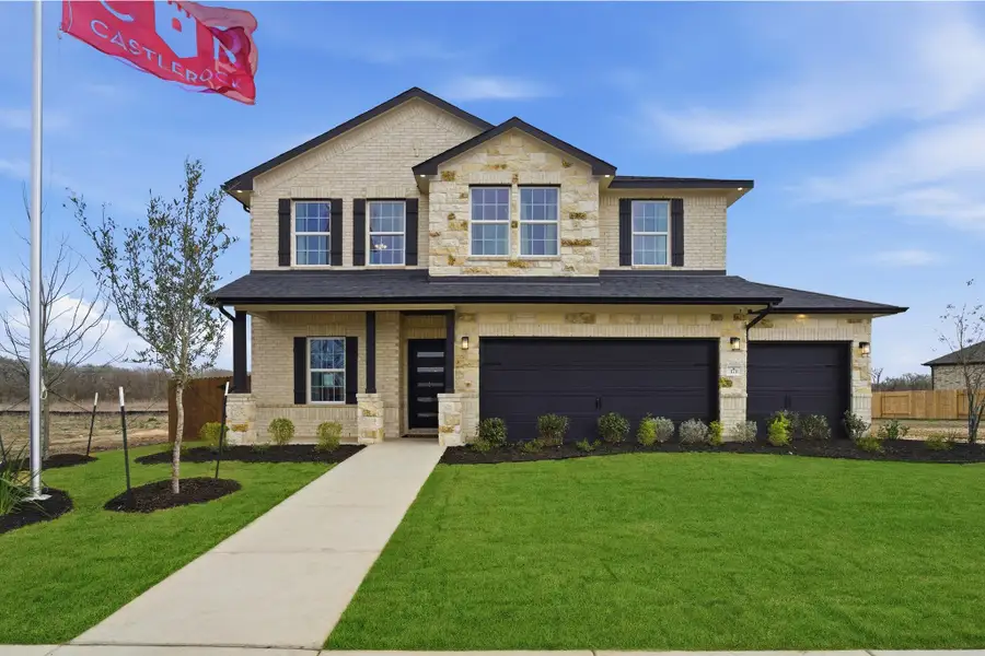 Front exterior of a home in the Infinity Square community, located in Kyle, TX (Image 2).