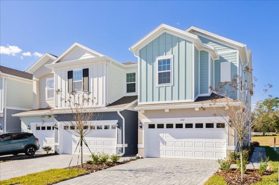 Front exterior of a home in the Liberty Station Townhomes community, located in Orange City, FL (Image 2). Front exterior of a home in the Liberty Station Townhomes community, located in Orange City, FL (Image 2).