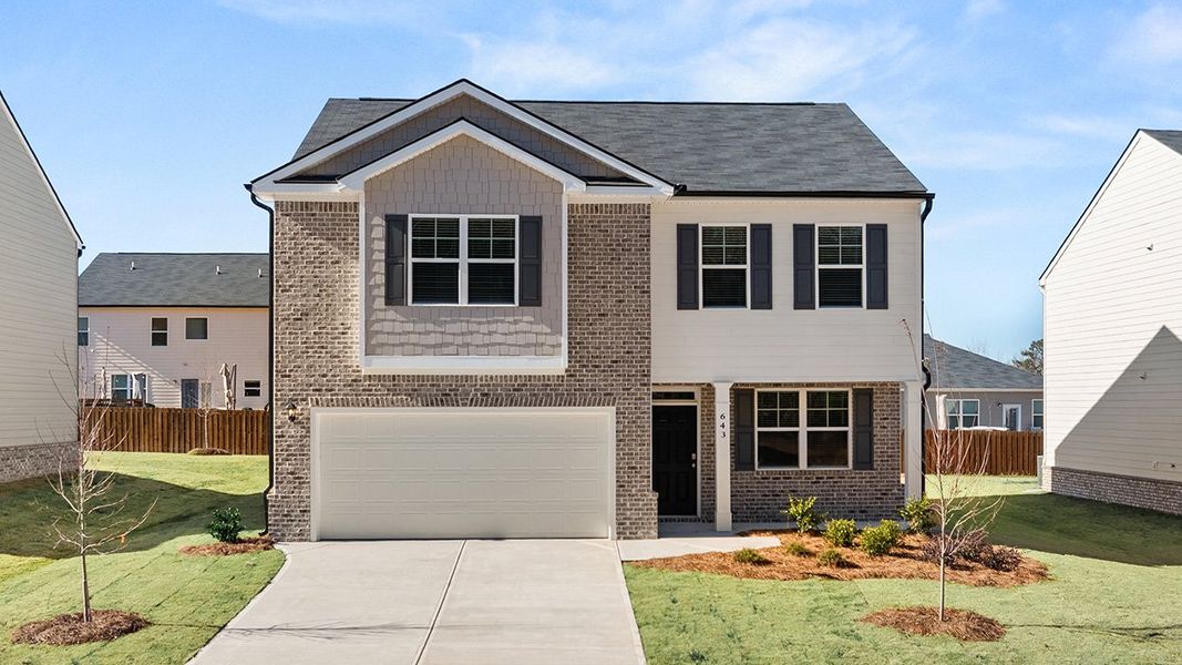 Front exterior of a home in the Locust Grove Station - Cedar Ridge community, located in Locust Grove, GA (Image 16).