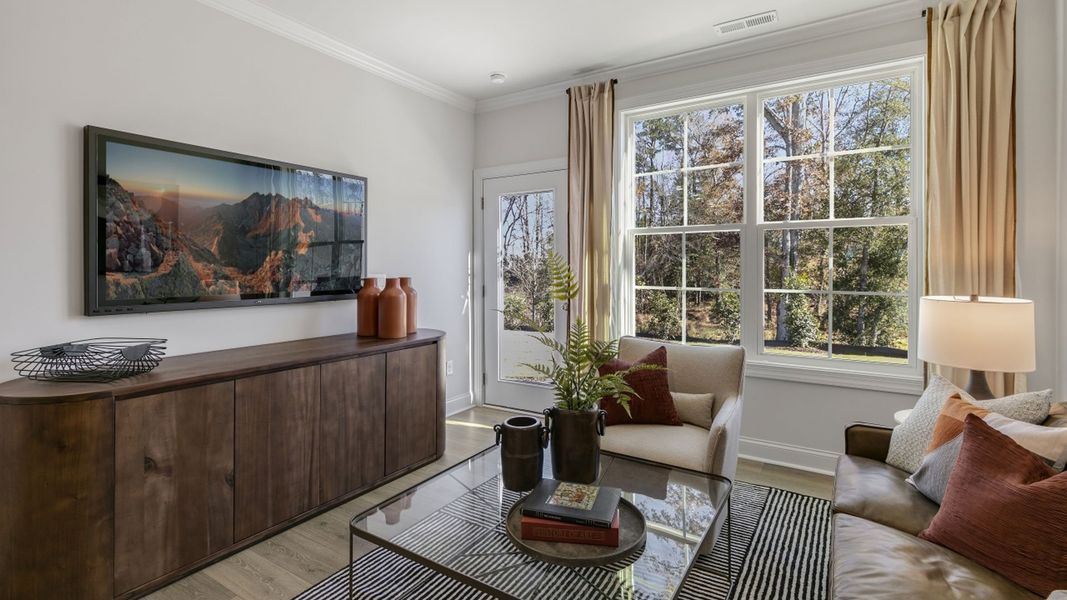 Furnished interior in a model home at The Meadows at Kinsley in Jamestown (Image 8).