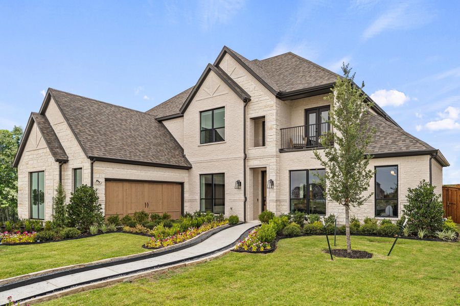 Front exterior of a home in the Winding Creek community, located in Rockwall, TX (Image 4).