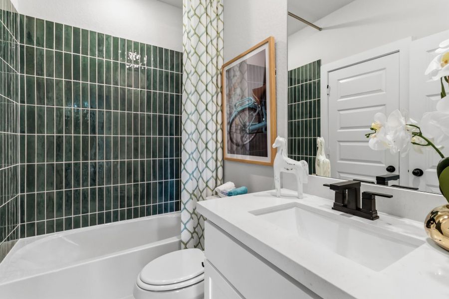 Furnished interior in a model home at Villas Las Flores in Floresville (Image 27).