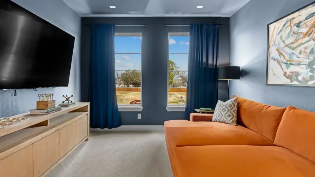 Furnished interior in a model home at White Rock Trail Addition in Dallas (Image 16).