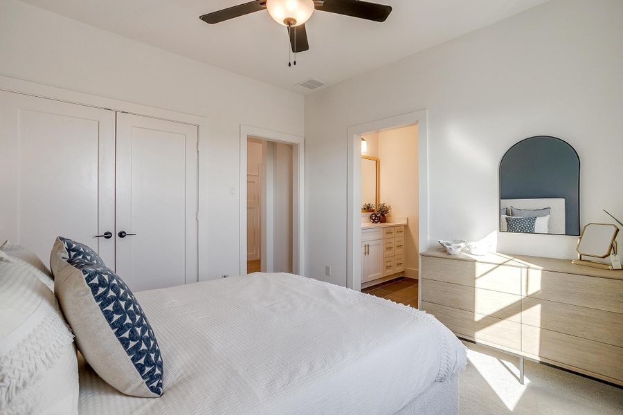 Furnished interior in a model home at MidTowne in Midlothian (Image 42).