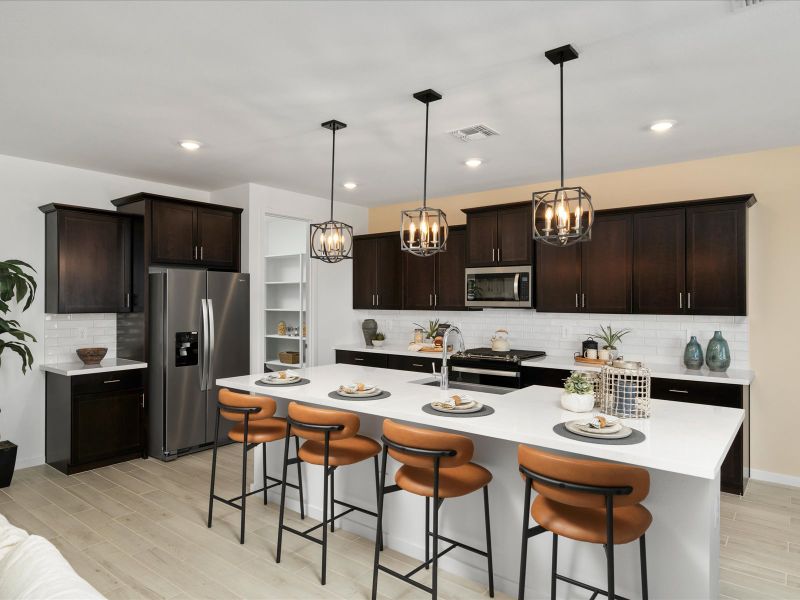 Furnished interior in a model home at Entrada Signature Series in Tolleson (Image 2). Furnished interior in a model home at Entrada Signature Series in Tolleson (Image 2).
