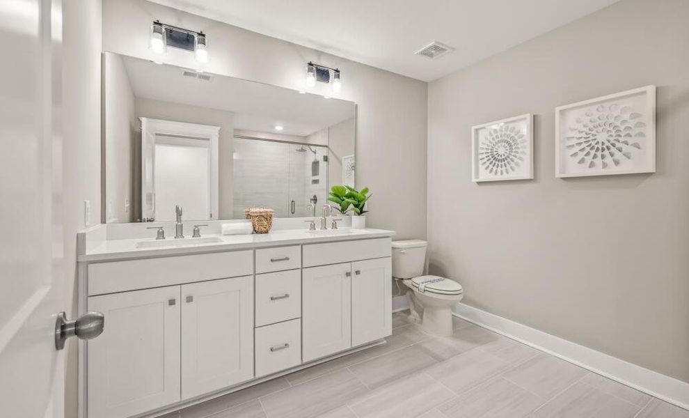 Furnished interior in a model home at The Bluffs at Pinefield Townhomes in Charleston (Image 9). Furnished interior in a model home at The Bluffs at Pinefield Townhomes in Charleston (Image 9).