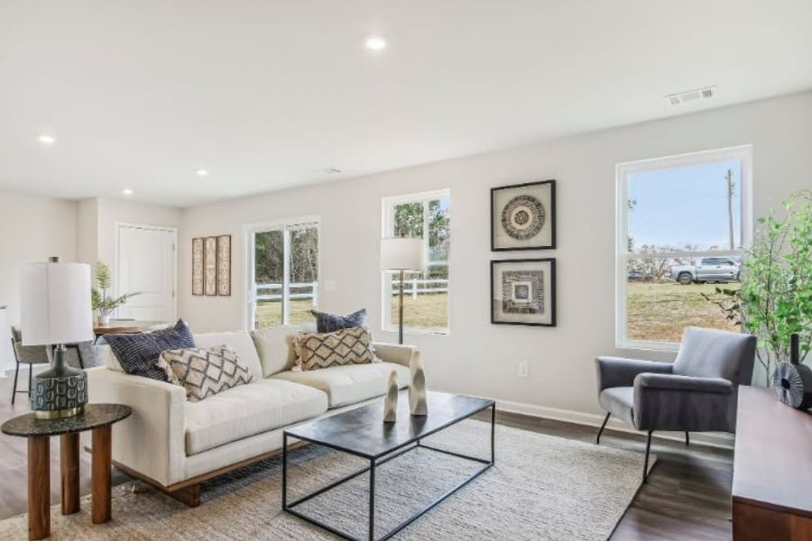 A living room with a large window.