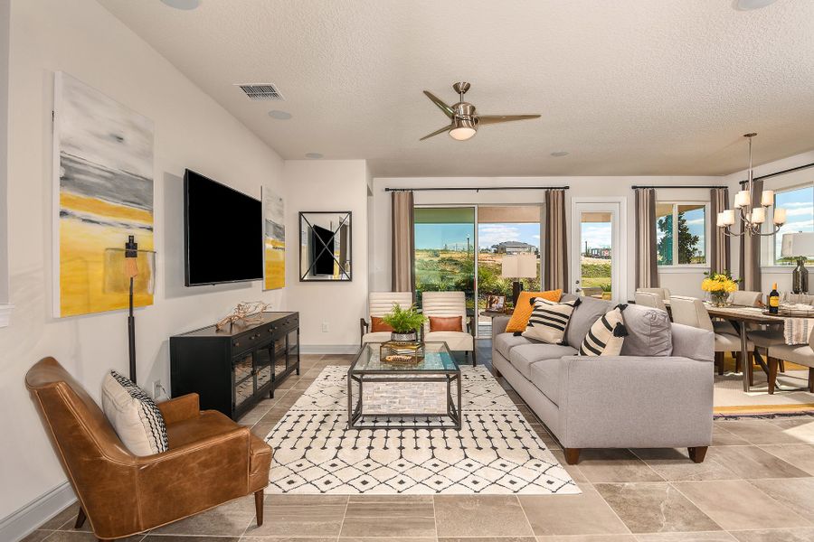 Furnished interior in a model home at John's Lake Landing - Cottage Series in Clermont (Image 8).