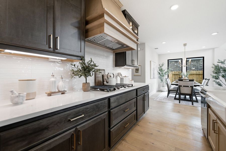 Furnished interior in a model home at Grand Magnolia in Waller (Image 30).