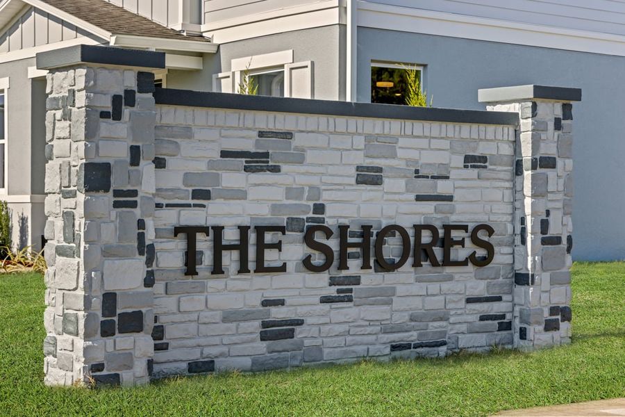 Entrance to the The Shores I community in St. Cloud, FL, featuring signage and landscaping (Image 1).