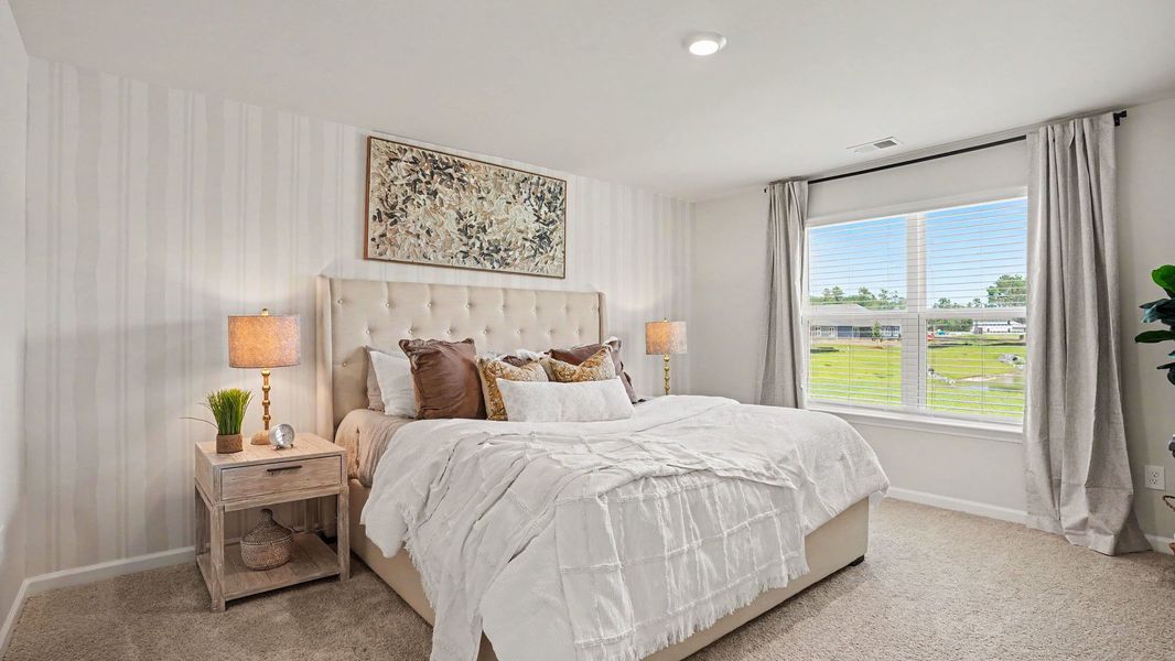 Furnished interior in a model home at Evington Place in Longs (Image 12).