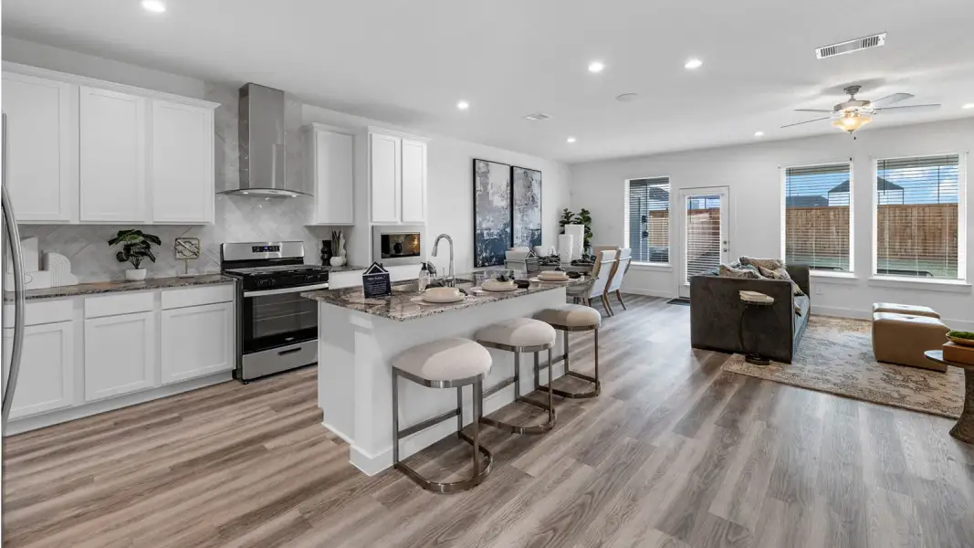 Furnished interior in a model home at Alexander Townhomes in Pearland (Image 6).