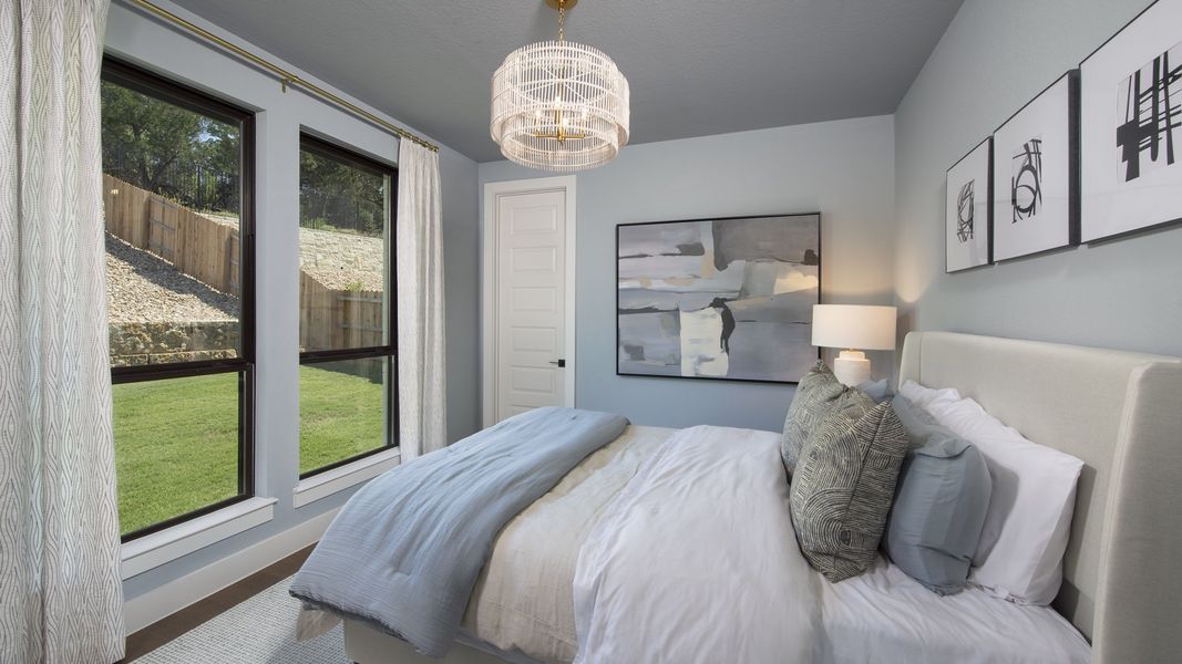 Furnished interior in a model home at Palmera Ridge 60' in Leander (Image 38).