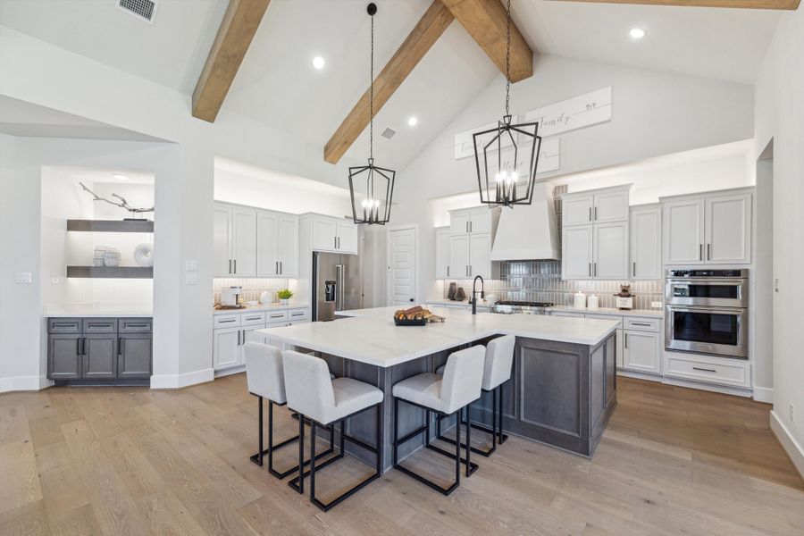 Furnished interior in a model home at The Woodlands Hills – 65' in Willis (Image 10).
