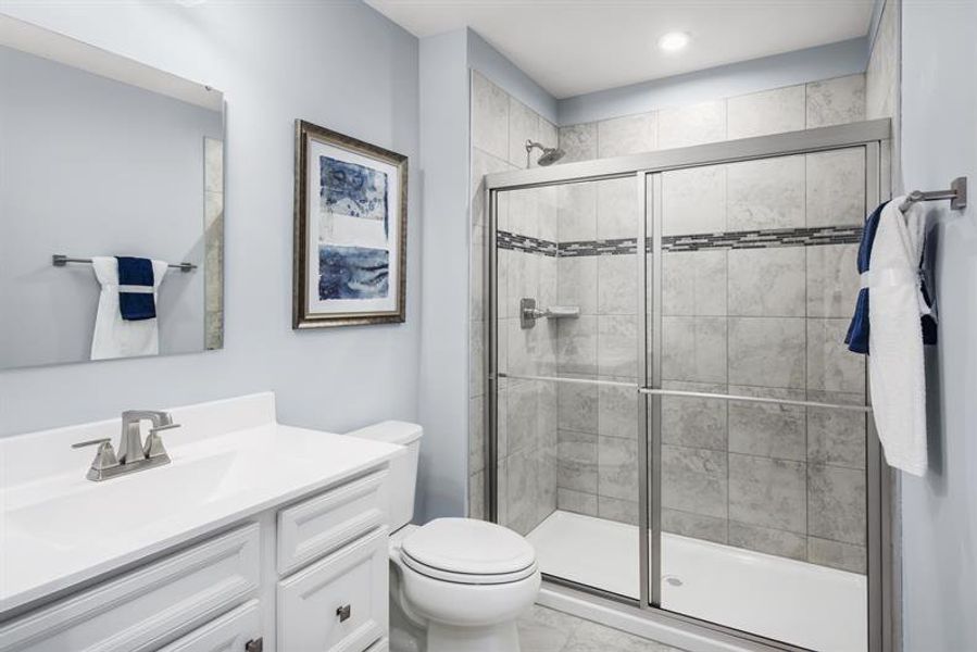 Walk-in showers with a bench seat, wide hallway, and raised vanities included for your comfort.