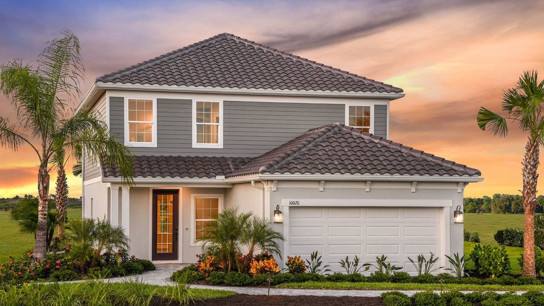 Front exterior of a home in the Grand Park Real Estate and Homes for Sale in Sarasota, FL - Neal Communities community, located in Sarasota, FL (Image 15).