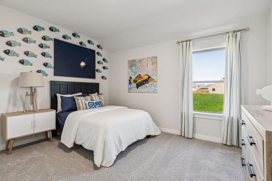 REPRESENTATIVE PHOTO – Bedroom in the Oscar model home in Aledo TX by Trophy Signature Homes