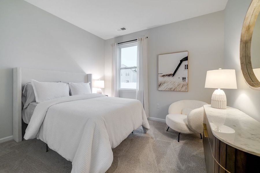 Furnished interior in a model home at Autumn's Wood in Brunswick (Image 23).