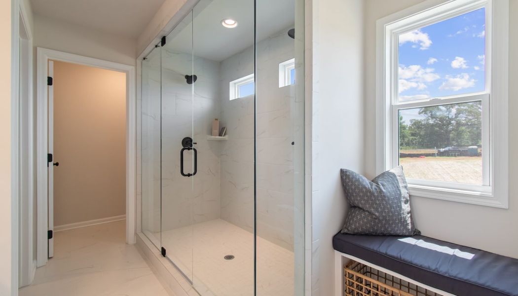 Furnished interior in a model home at Kentmere in Auburn (Image 48).