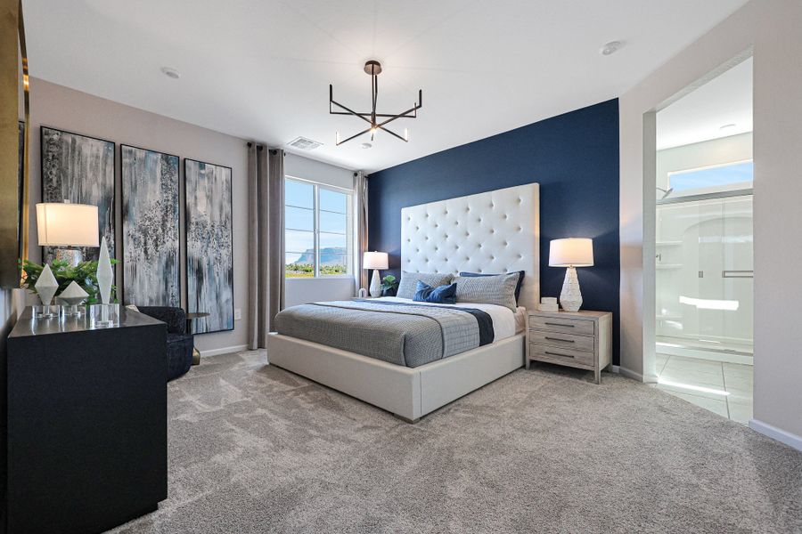 A bedroom with a large bed. A bedroom with a large bed.