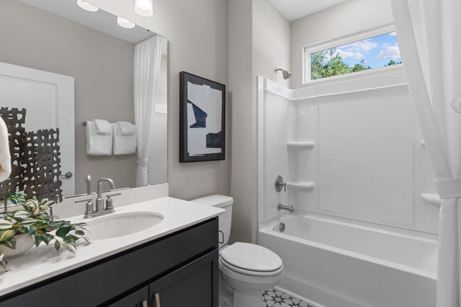 Furnished interior in a model home at Goose Marsh in Bolivia (Image 26).