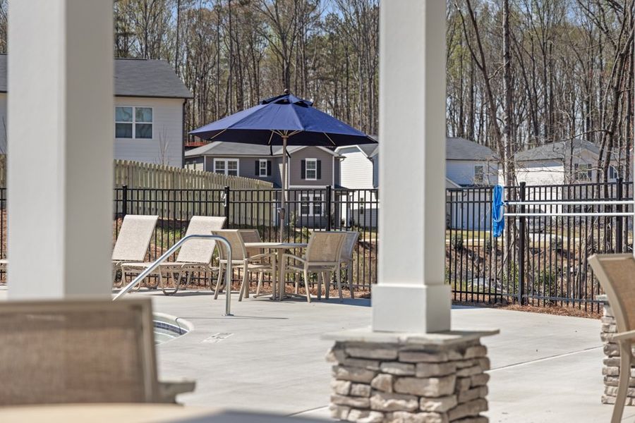 A patio with tables and chairs. A patio with tables and chairs.