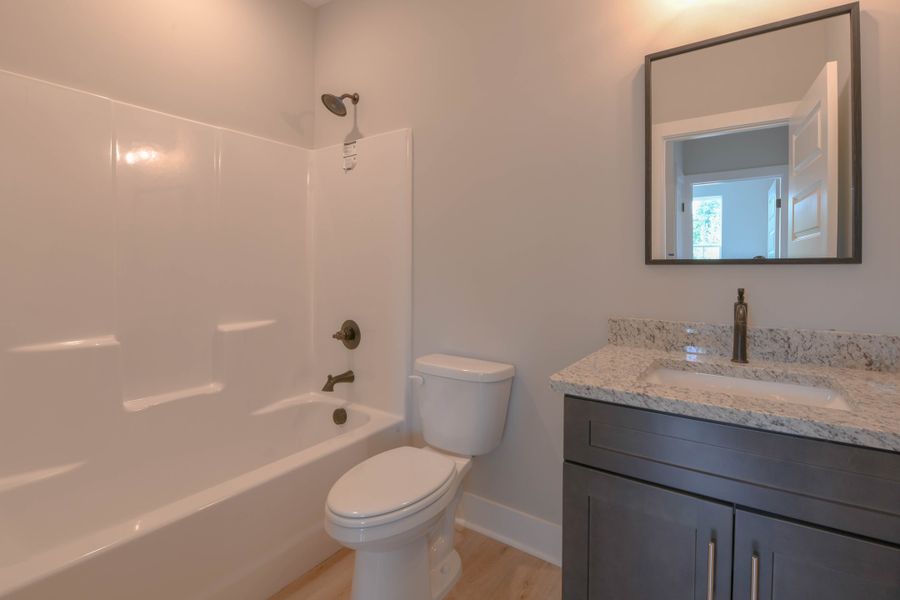 Furnished interior in a model home at Judah Hills in Cross Plains (Image 12).