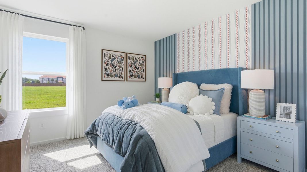 Furnished interior in a model home at Watermark in Alvin (Image 23).