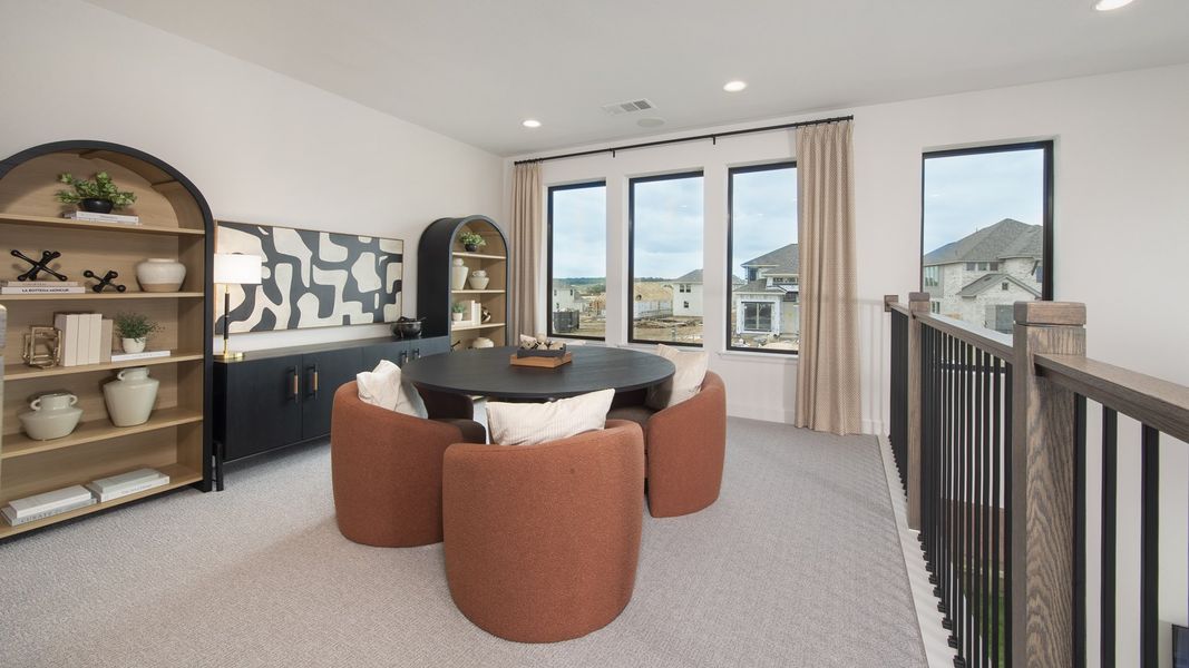Furnished interior in a model home at Lariat 45' in Liberty Hill (Image 20).