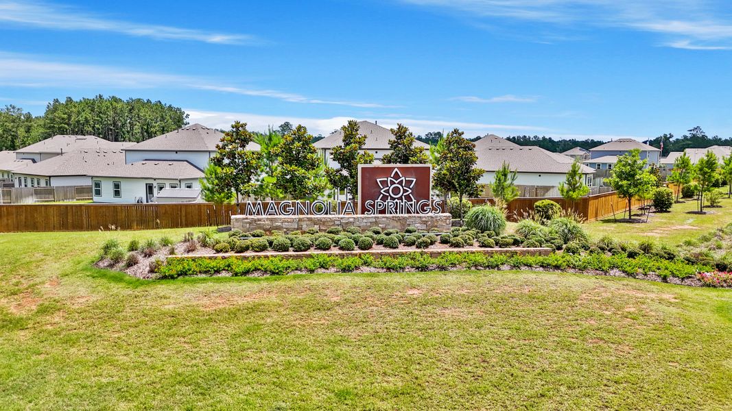 Entrance to the Magnolia Springs community in Montgomery, TX, featuring signage and landscaping (Image 12).