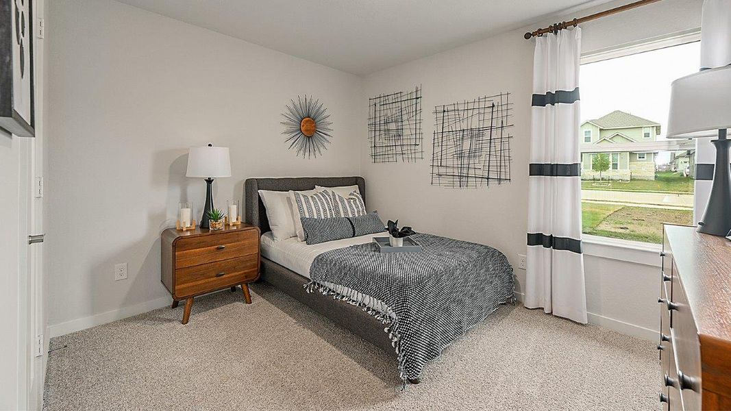 Furnished interior in a model home at Midtown Reserve in College Station (Image 11).