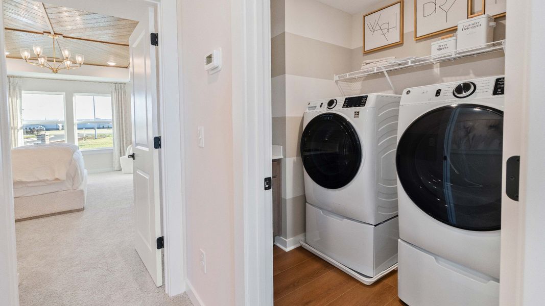Furnished interior in a model home at Bearwood Classics in Mount Pleasant (Image 18).