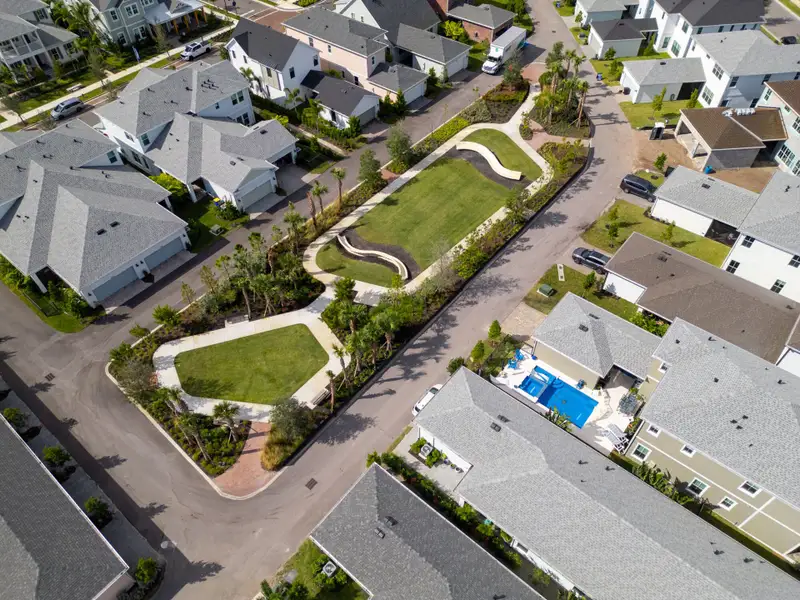 Aerial view of the Newfield - Rosette Park community in Palm City, FL, showing layout and nearby surroundings (Image 7).