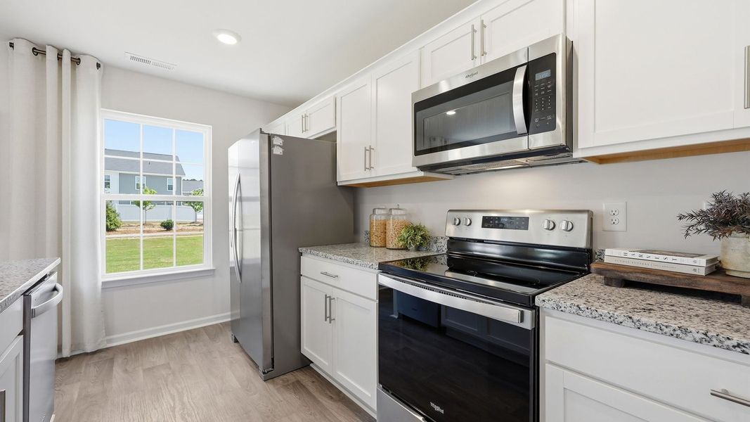 Furnished interior in a model home at Carter Ridge in Greenville (Image 13).