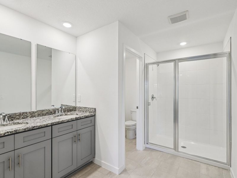 Furnished interior in a model home at Lakes at Bella Lago - Premier Series in Green Cove Springs (Image 7).