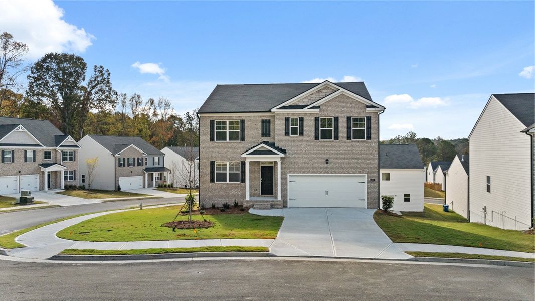 Front exterior of a home in the Brooks Village community, located in Dacula, GA (Image 3).