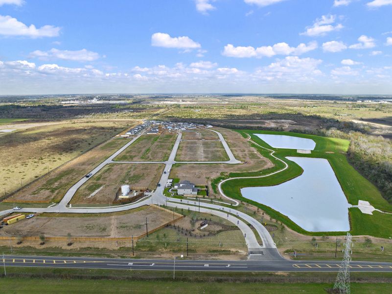 A large area with roads and a body of water in it with Prairie Queen Recreation Area in the background. A large area with roads and a body of water in it with Prairie Queen Recreation Area in the background.
