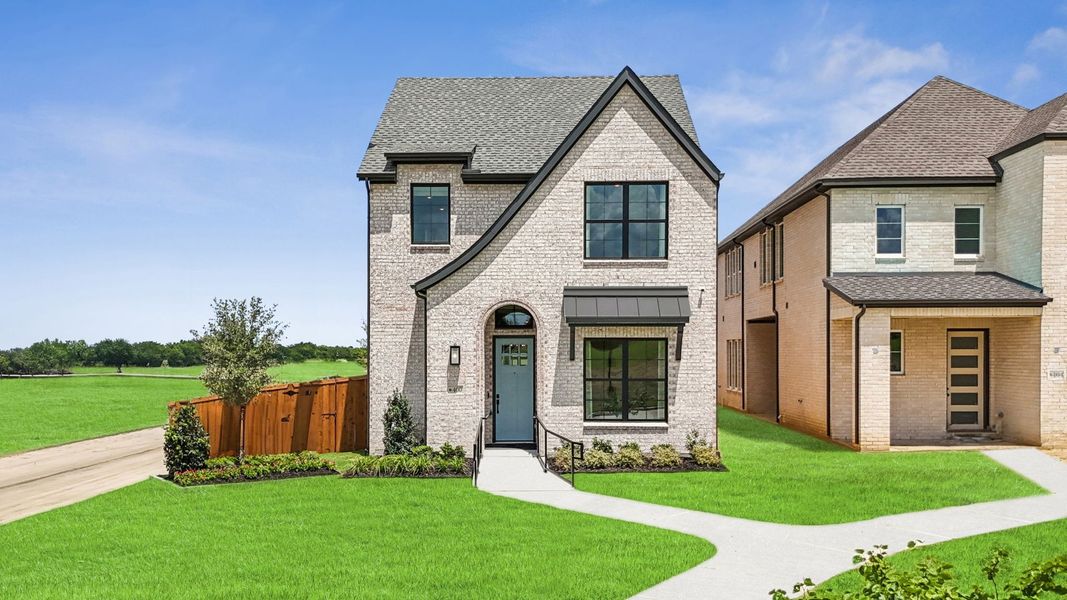 Front exterior of a home in the The Heights at Uptown community, located in Celina, TX (Image 2).