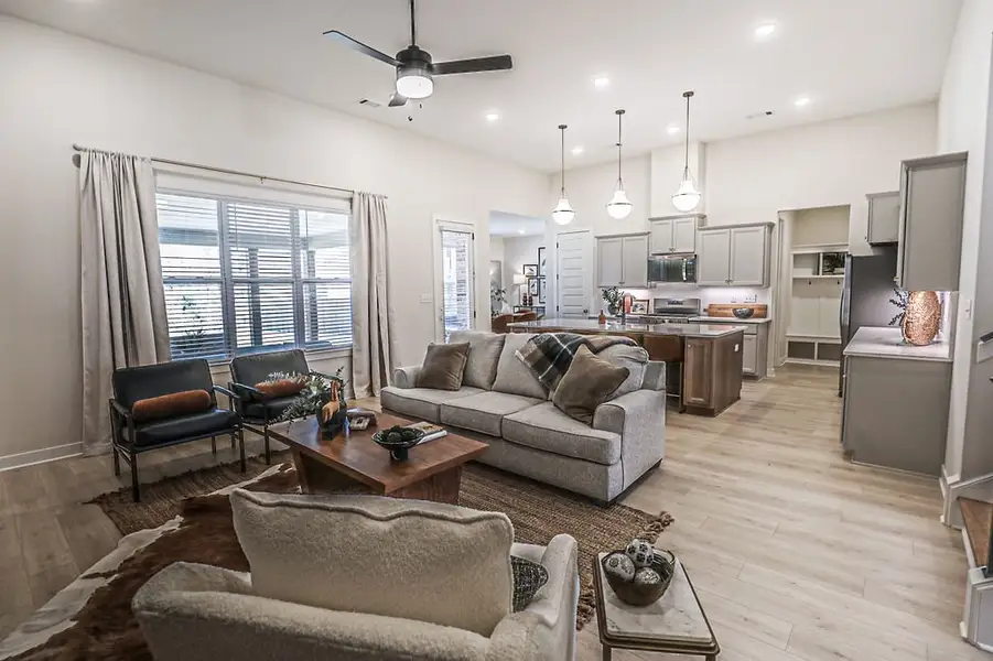 Furnished interior in a model home at Walker Farms in Bartlett (Image 7).