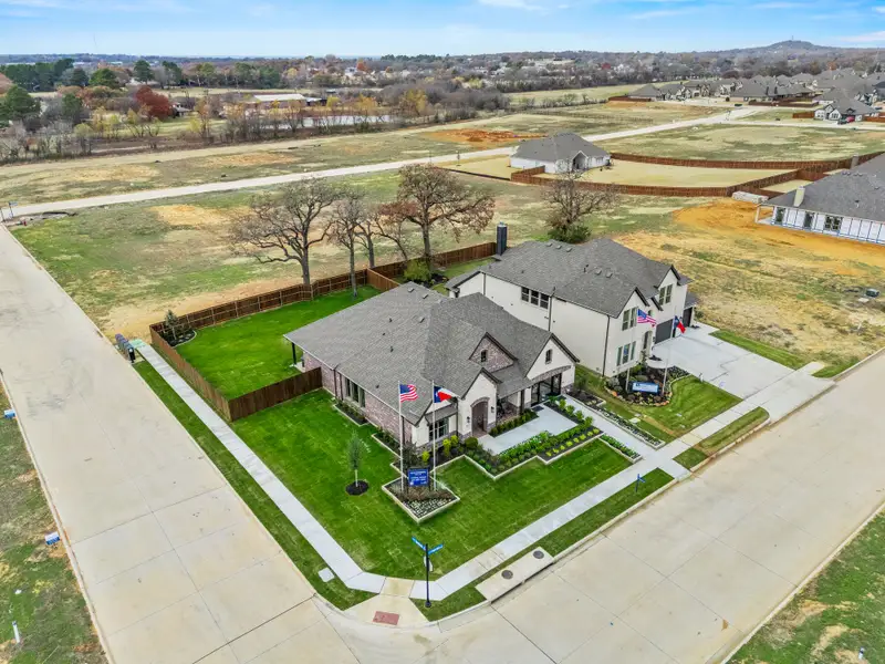 Aerial view of the Mockingbird Hills - Signature Series community in Joshua, TX, showing layout and nearby surroundings (Image 11).
