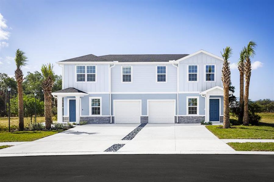 All villas are low‑maintenance end homes with garage, oversized driveway and included lawn care.