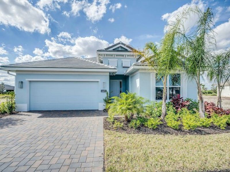Front exterior of a home in the Lake Park at Tradition community, located in Port St. Lucie, FL (Image 47).