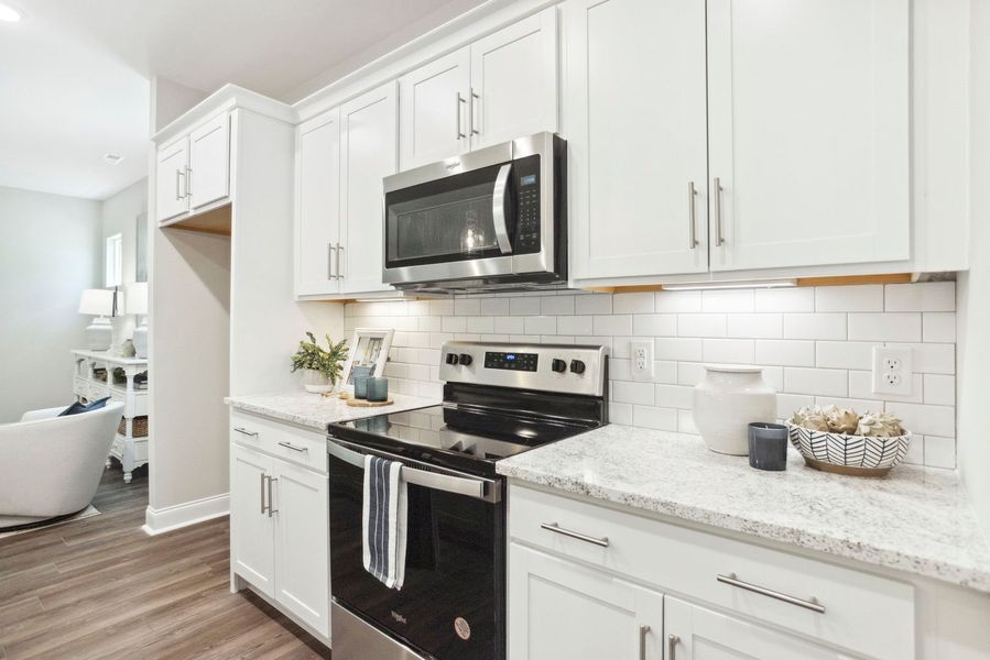 Furnished interior in a model home at Rourk Woods in Shallotte (Image 25).