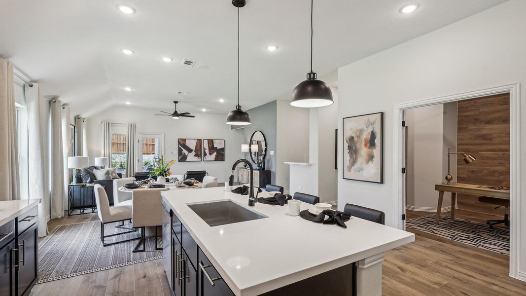 Discover exquisite design in this Churchill home, featuring a sleek island and premium wood floors. Discover exquisite design in this Churchill home, featuring a sleek island and premium wood floors.