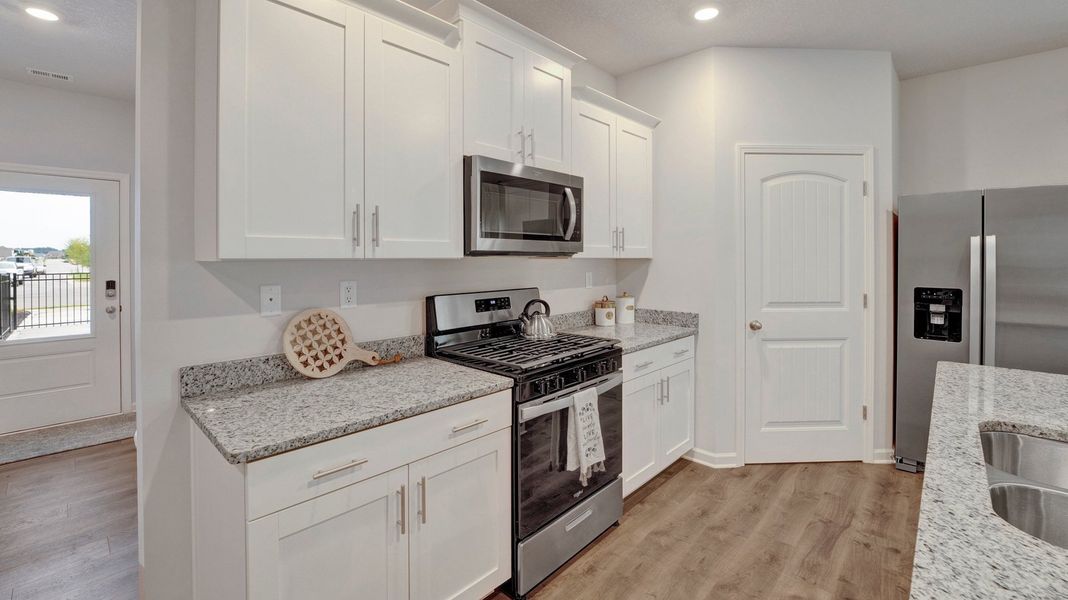 Furnished interior in a model home at Riverwood Gardens in Oakland (Image 34).