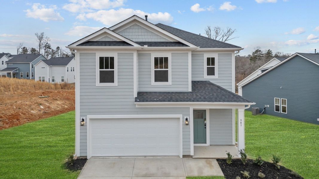 Cool toned exterior two story home with two car garage at Pleasant Falls by DRB Homes in Moore, SC