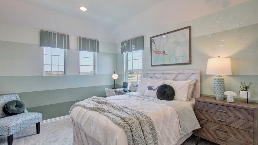 Experience refined comfort with chic accents and ample light in this Meyer Ranch bedroom.
