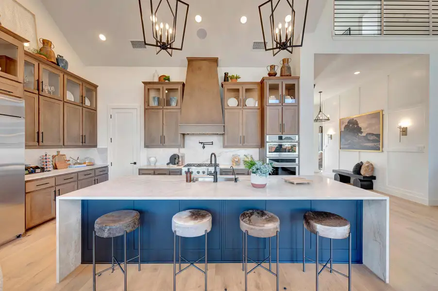 Furnished interior in a model home at Whyburn Manor Series in Flower Mound (Image 5).